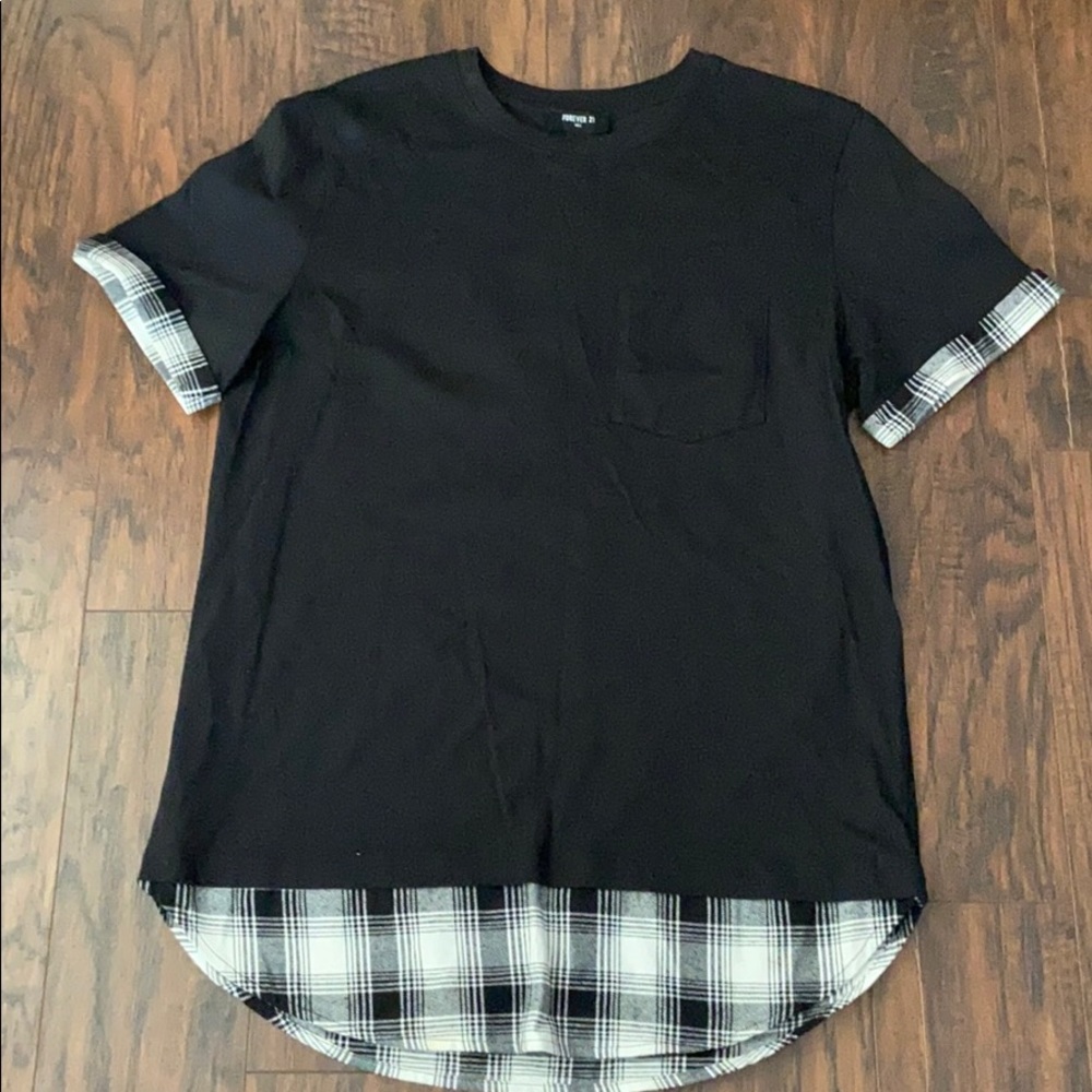 Black and plaid short sleeve shirt. Size XS.